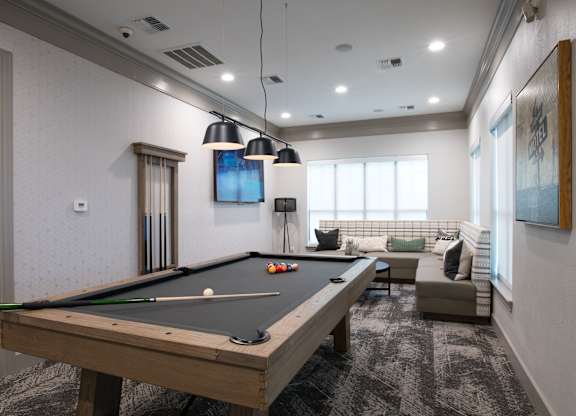 Game room with pool table at Silverado Apartments, Frisco, TX 75034