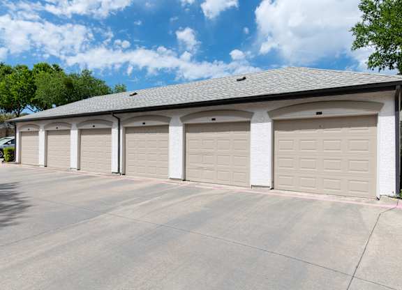 Multibay garage with arched entryways at Silverado Apartments, Frisco