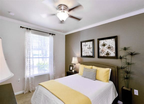 Bedroom ceiling fan in 1 and 2 bedroom apartments For Rent in North Dallas, TX. Now leasing at Montfort Place.