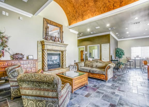 Fireplace and entrance seating at Tuscany Square Apartments in North Dallas, TX, For Rent. Now leasing Studio, 1 and 2 bedroom apartments.