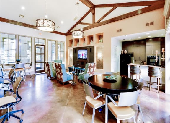 Clubhouse with small kitchen at Mission at La Villita Apartments in Irving, TX offers 1, 2 & 3 bedroom apartment homes with appliances.
