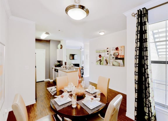 Spacious dining room at Mission at La Villita Apartments in Irving, TX offers 1, 2 & 3 bedroom apartment homes with appliances.