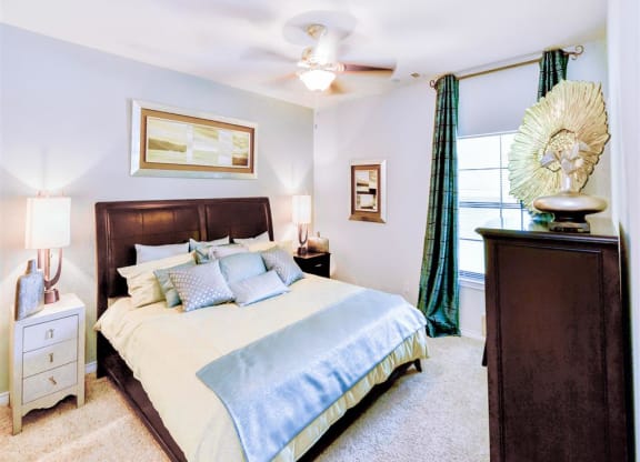 Large bedrooms with bright windows at Mission at La Villita Apartments in Irving, TX offers 1, 2 & 3 bedroom apartment homes with appliances.
