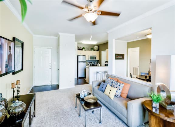 Spacious living rooms with bright windows at Mission at La Villita Apartments in Irving, TX offers 1, 2 & 3 bedroom apartment homes with appliances.