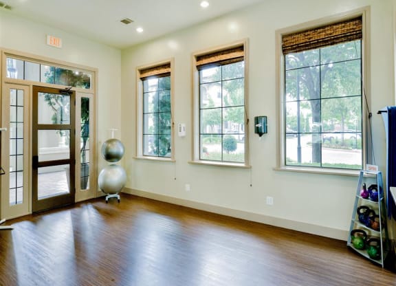 Pilates and yoga studio at Mission at La Villita Apartments in Irving, TX offers 1, 2 & 3 bedroom apartment homes with appliances.