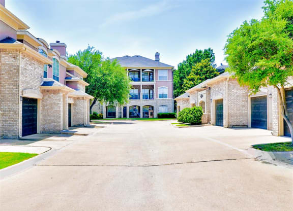 Direct access garages at Bentley Place at Willow Bend Apartments in West Plano, TX, For Rent. Now leasing 1, 2, and 3 bedroom apartments.
