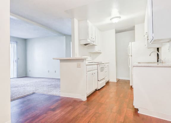 Open concept kitchen and entertaining area at Village Park Apartments in Encinitas, CA, For Rent. Now leasing 2 and 3 bedroom apartments.