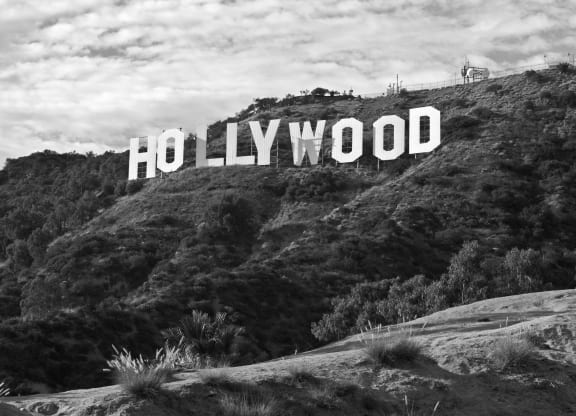 a black and white photo of the hollywood sign