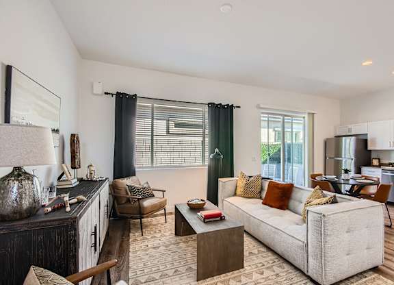 Living room and kitchen with wood flooring at Hampton Meridian, Apache Junction, 85120