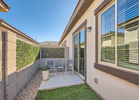 Green Space backyard with a patio at Hampton Meridian, Apache Junction, Arizona
