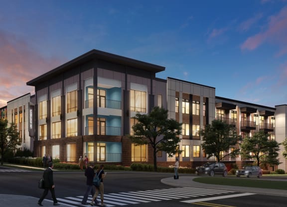 a rendering of a building with people crossing a street in front of it at Link Apartments® Broad Ave, Tennessee