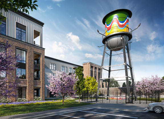 an artist rendering of a water tower in front of a building at Link Apartments® Broad Ave, Tennessee