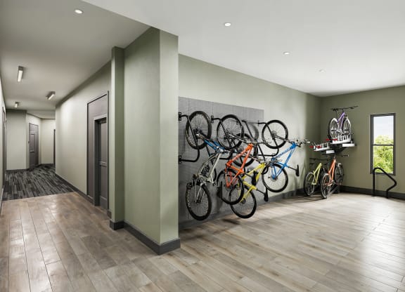 a row of bikes on a wall in a room at Link Apartments® CYKEL Apartments, Charlotte , NC 28208