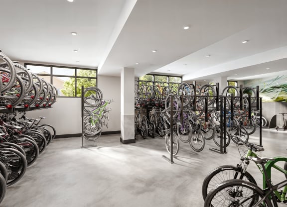 a large room filled with lots of bikes on display at Link Apartments® CYKEL Apartments, Charlotte , NC