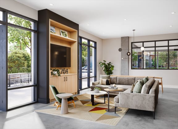 a living room with a couch and a table at Link Apartments® CYKEL Apartments, Charlotte 