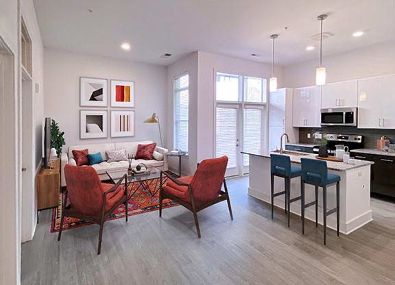 Modern Living Room With Kitchen View at Link Apartments® Linden, North Carolina, 27517