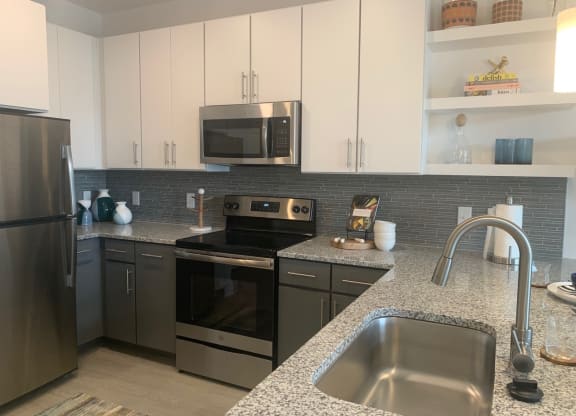 Spacious new kitchen with granite counter tops at Link Apartments® Mixson, North Charleston, SC, 29405