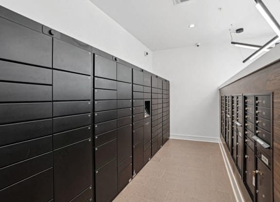 a long row of lockers in a hallway of a building