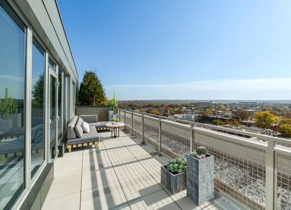 a view of the city from the balcony of a house  at Link Apartments® H Street, Washington, 20002