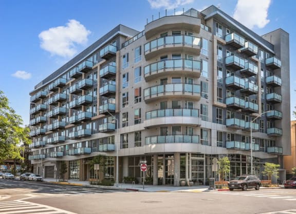 an apartment building on the corner of a city street at Link Apartments® Four 12, Oakland, CA