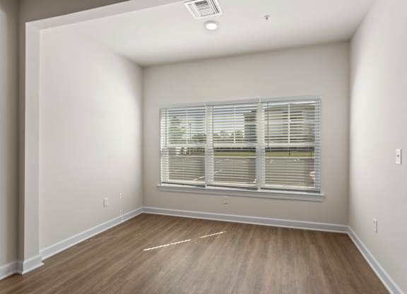Peaks of Lexington Apartments living room and windows