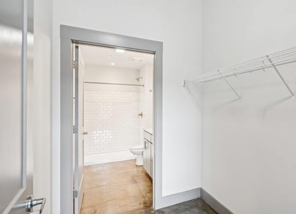Closet connected to bathroom in Converse Mill Lofts in Spartanburg, SC.