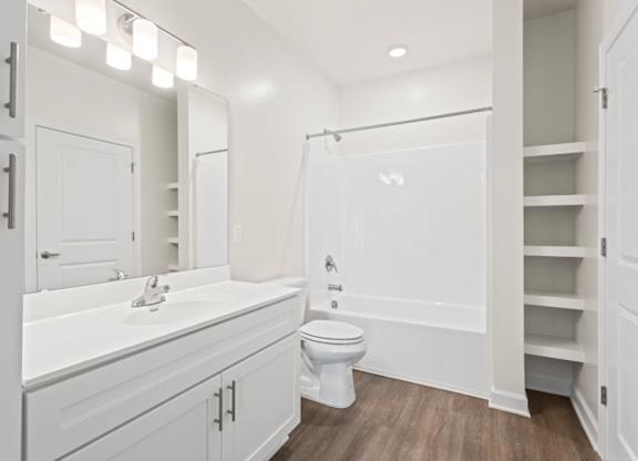 Peaks of Lexington Clubhouse Bathroom with tub and shower and shelves
