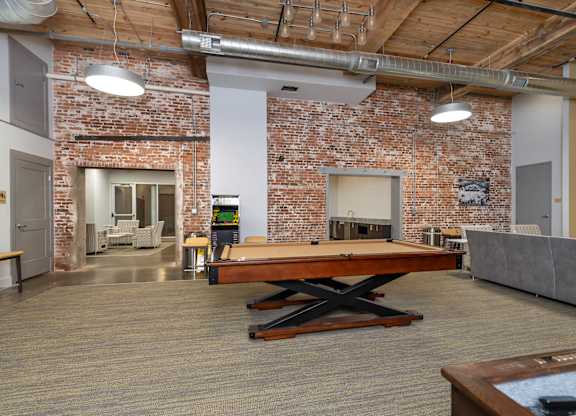 Converse Mill Lofts Apartments Recreation and Gaming Lounge with pool table