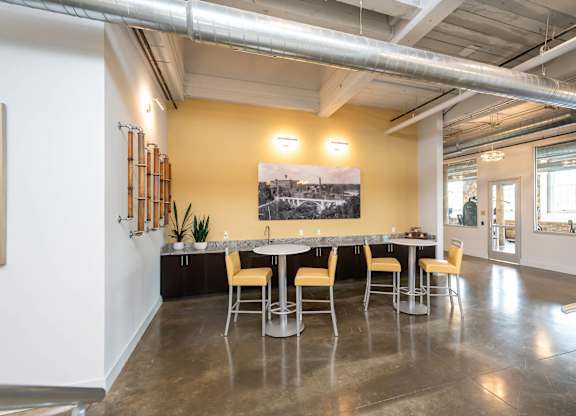 Converse Mill Lofts Apartments in Spartanburg SC with tables and chairs