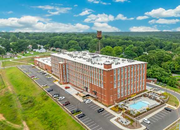 Aerial View of Converse Mill Lofts Apartments in Spartanburg SC, facing the pool