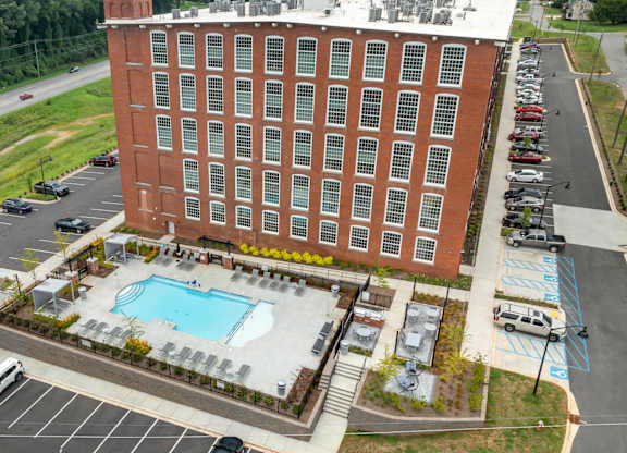 Aerial View of Converse Mill Lofts Apartments in Spartanburg SC, facing the pool
