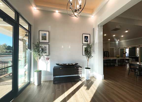 a view of the living room from the entrance to the dining room