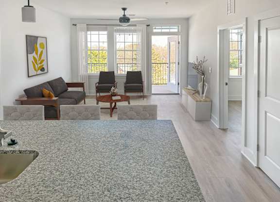 Gordon Street Lofts Living Room, viewed from the kitchen's granite countertop. The living room features cup lights