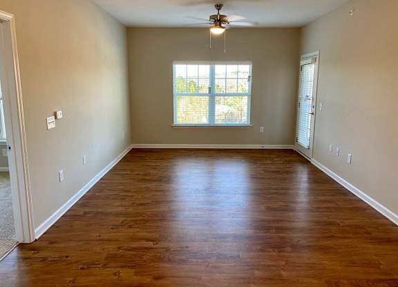 Linden Square Apartments living room with hardwood-style floors