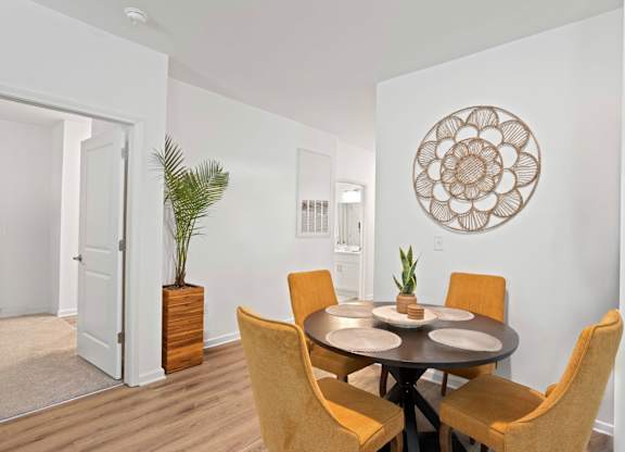 Ovata at Reedy Creek living room with LVT flooring and ceiling fan