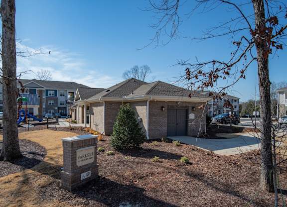 A residential area with houses and trees.