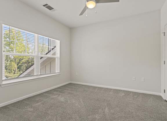 Parkway East bedroom with ceiling fan