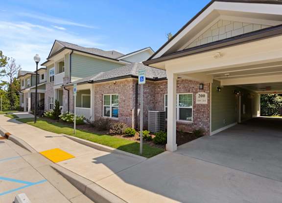 Parkway East Apartments entryway and handicap-accessible parking