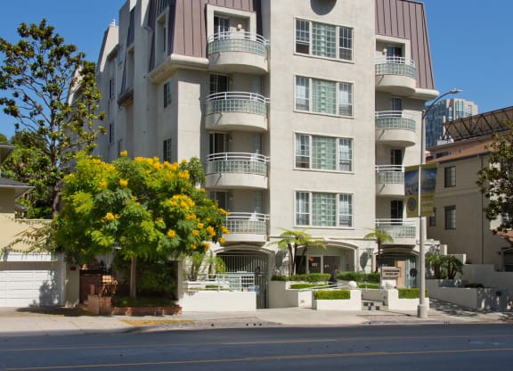 Elevated view of the front exterior of an apartment building.