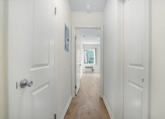 Apartment hallway to bedroom and bathroom