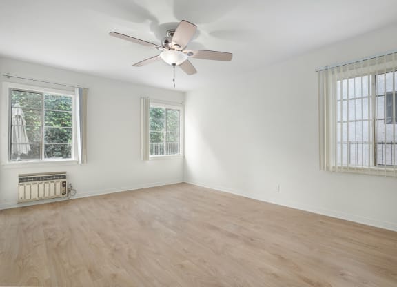 Apartment bedroom with windows