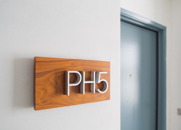 Apartment unit identification sign