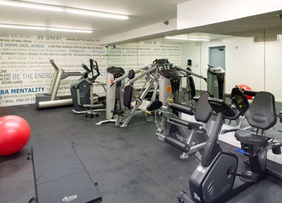 Apartment fitness center with gym equipment. at Midvale Court, Los Angeles, CA