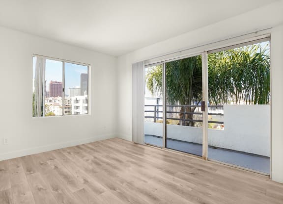 Living Area With Balcony at Midvale Towers, California