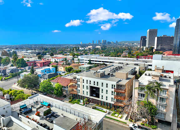 A cityscape with buildings and a clear sky at The Urbanpolitan, Los Angeles, CA