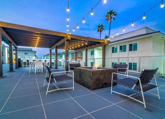 BBQ Grilling Area with fire pit at Bixby Hill Apartments, Long Beach, CA