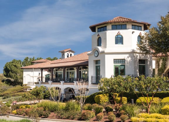 a building with a clock on the side of it  at Falcon Bridge at Gale Ranch, San Ramon, California