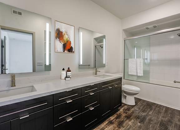 A bathroom with a white sink and a shower at Montecito at Carlsbad, Carlsbad, CA 92010