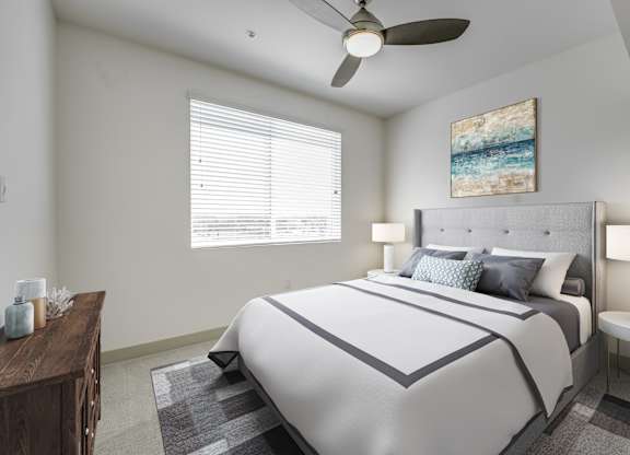 A bedroom with a large bed and a ceiling fan at Montecito at Carlsbad, Carlsbad, CA 92010