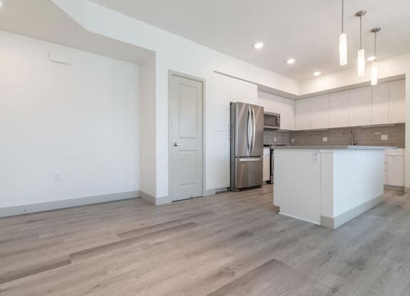 Unfurnished living and kitchen at Montecito Apartments at Carlsbad, Carlsbad, 92010
